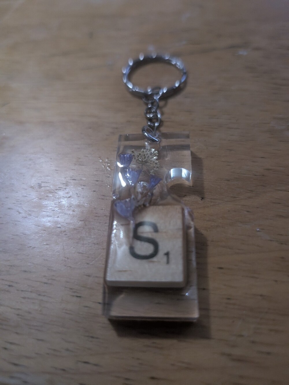 Clear Resin Keychain with Purple Floral Accent and 'S' Tile